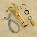 Top view of swan neck wash basin tap, single lever basin mixer in gold finish for Indian bathrooms