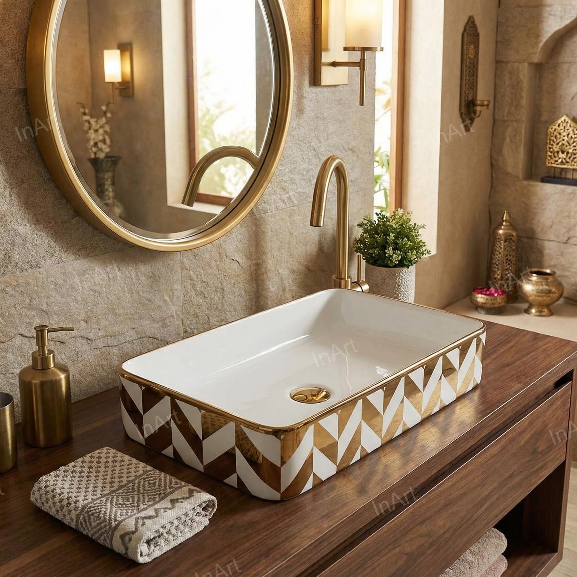 Bathroom wash basin close-up highlighting white and gold colour combination