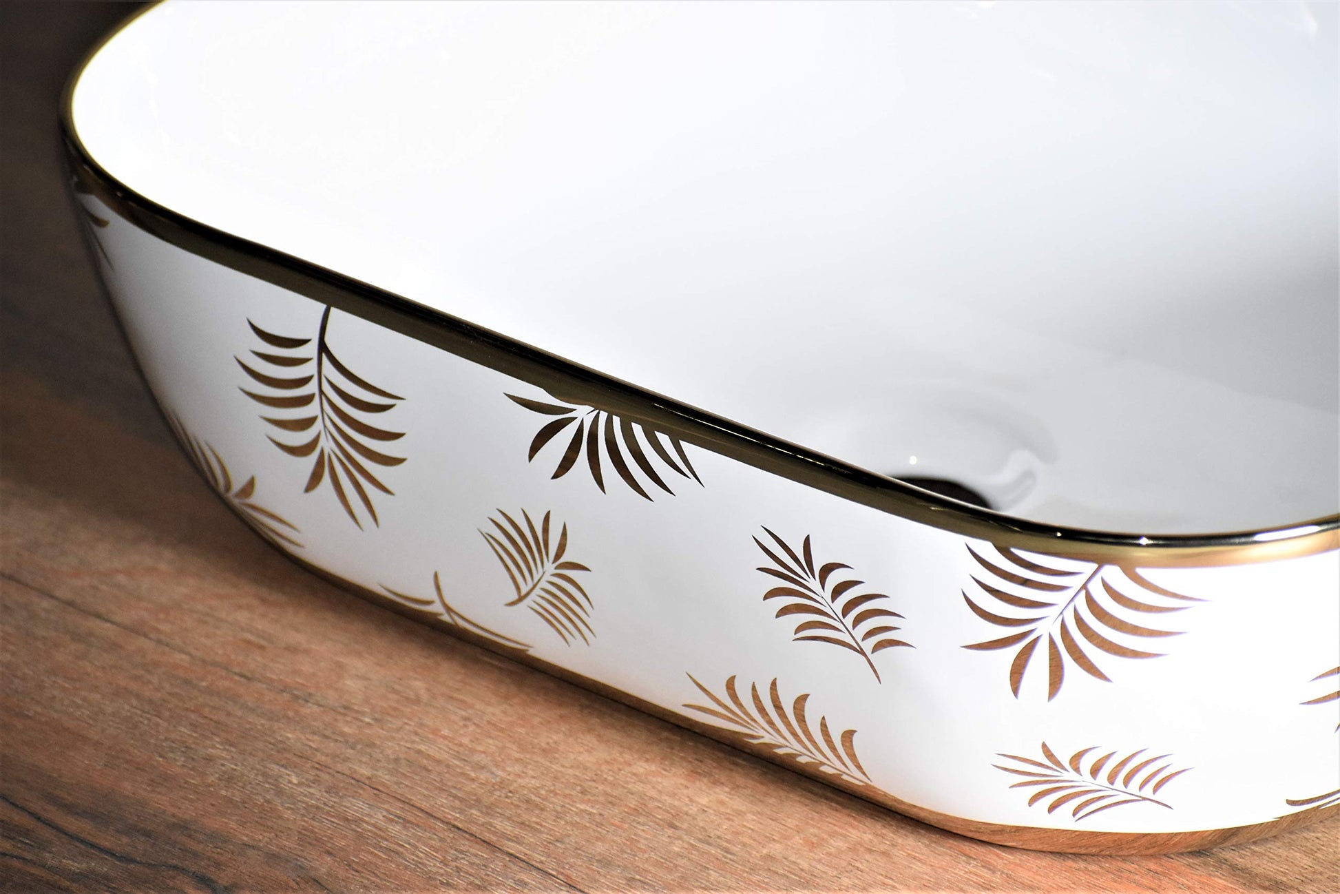 InArt golden colour wash basin for bathroom on vanity counter, luxury designer wash basin in interior setting