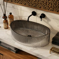 InArt hindware table top wash basin style in glossy black oval glass, countertop main view