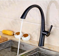 Kitchen sink pull out faucet in black finish, gooseneck swivel spout mixer tap shown at 3/4 angle