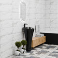 Living room wash basin design idea featuring matte black free standing pedestal basin with tap space