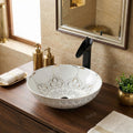 Close-up of glossy white ceramic wash basin with gold rim detailing, premium sanitaryware for bathroom