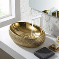InArt ceramic table top wash basin oval golden finish, main front view for modern bathroom