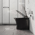 Black ceramic WC pan glossy finish close-up, rimless bowl design with soft close seat for modern bathrooms