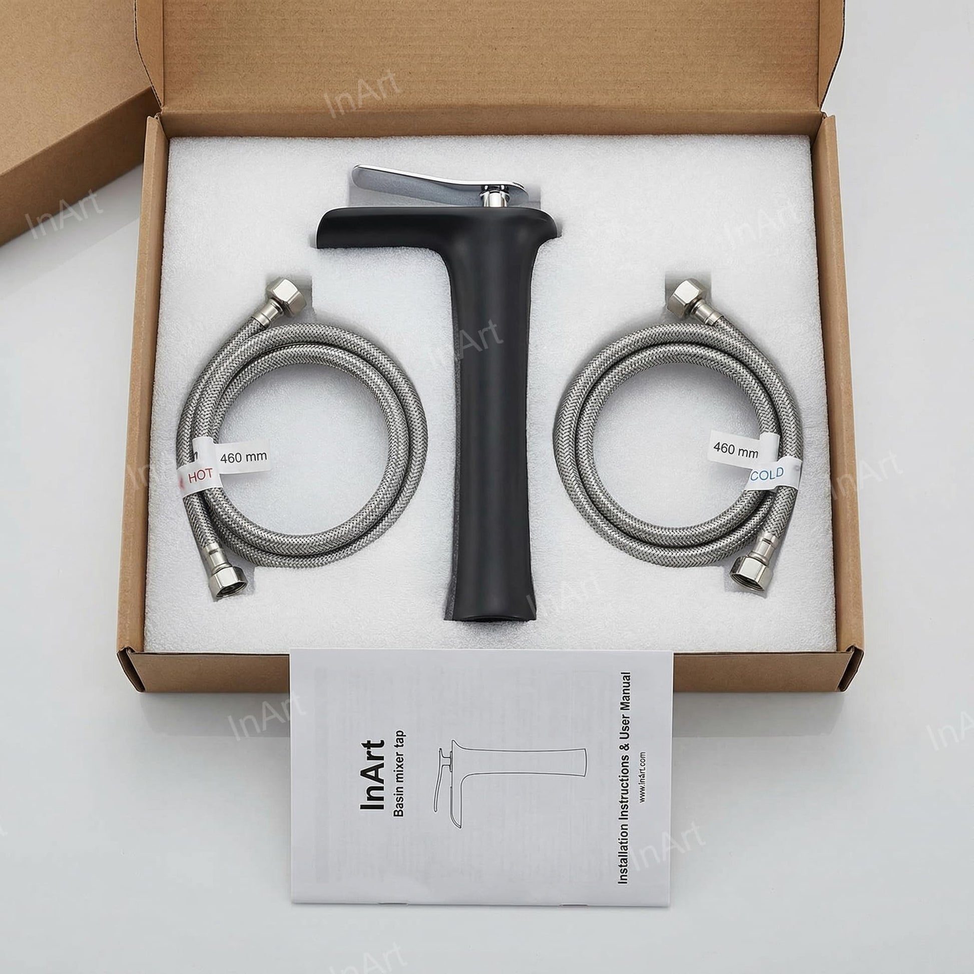 InArt single lever basin mixer tap with black chrome finish, brass construction, top view showing lever action