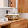 Modern table top wash basin design for bathroom, gold rectangular ceramic basin side angle with rim detail