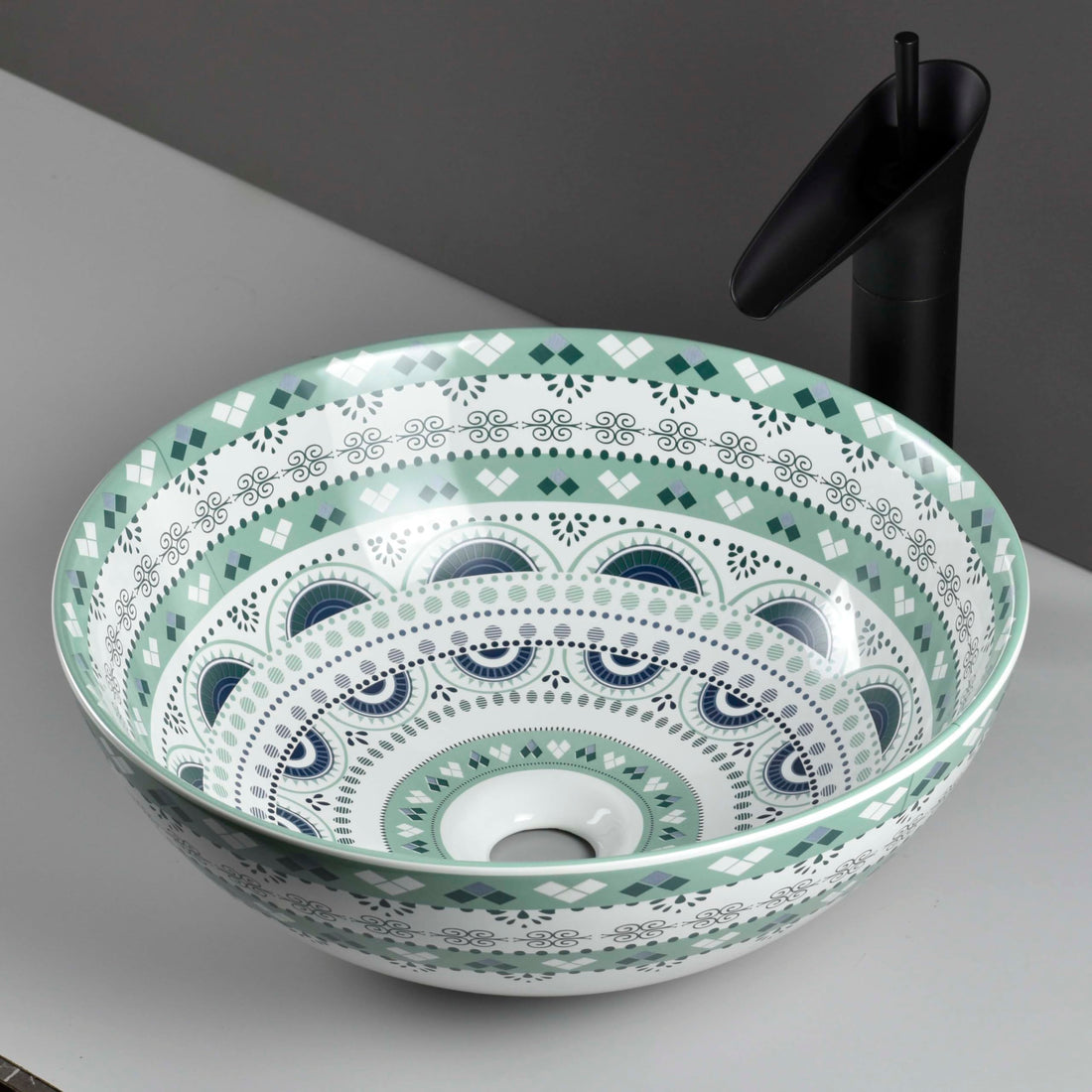 InArt ceramic table top wash basin design, round light blue modern bathroom sink, front view