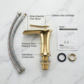 Golden waterfall basin tap, single lever wash basin mixer shown at left angle for modern bathroom