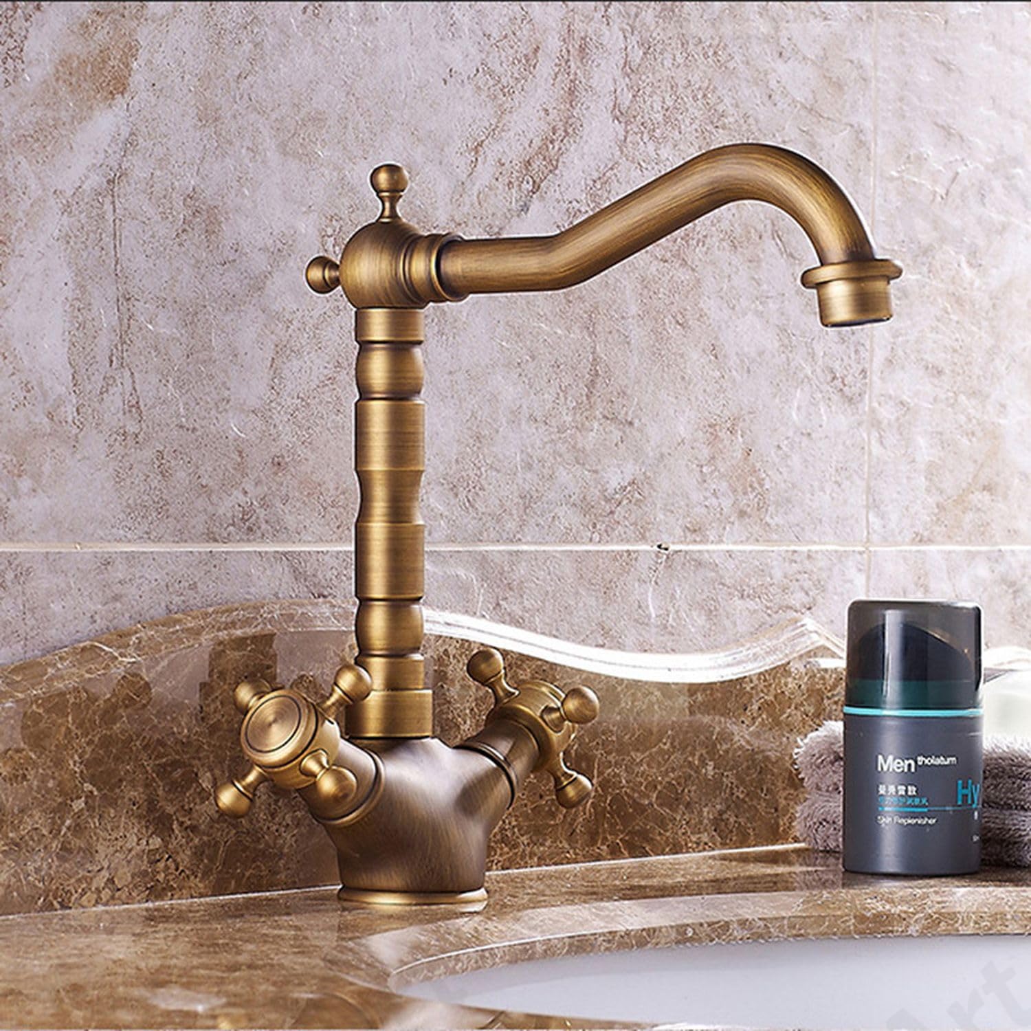 InArt waterfall basin tap in antique matt brass, deck mounted hot and cold mixer for bathroom wash basin