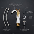 Designer tap for wash basin, InArt swan neck basin tap in polished gold and white, side angle view