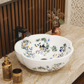 Close-up of floral pattern on glossy white ceramic designer wash basin for modern bathroom