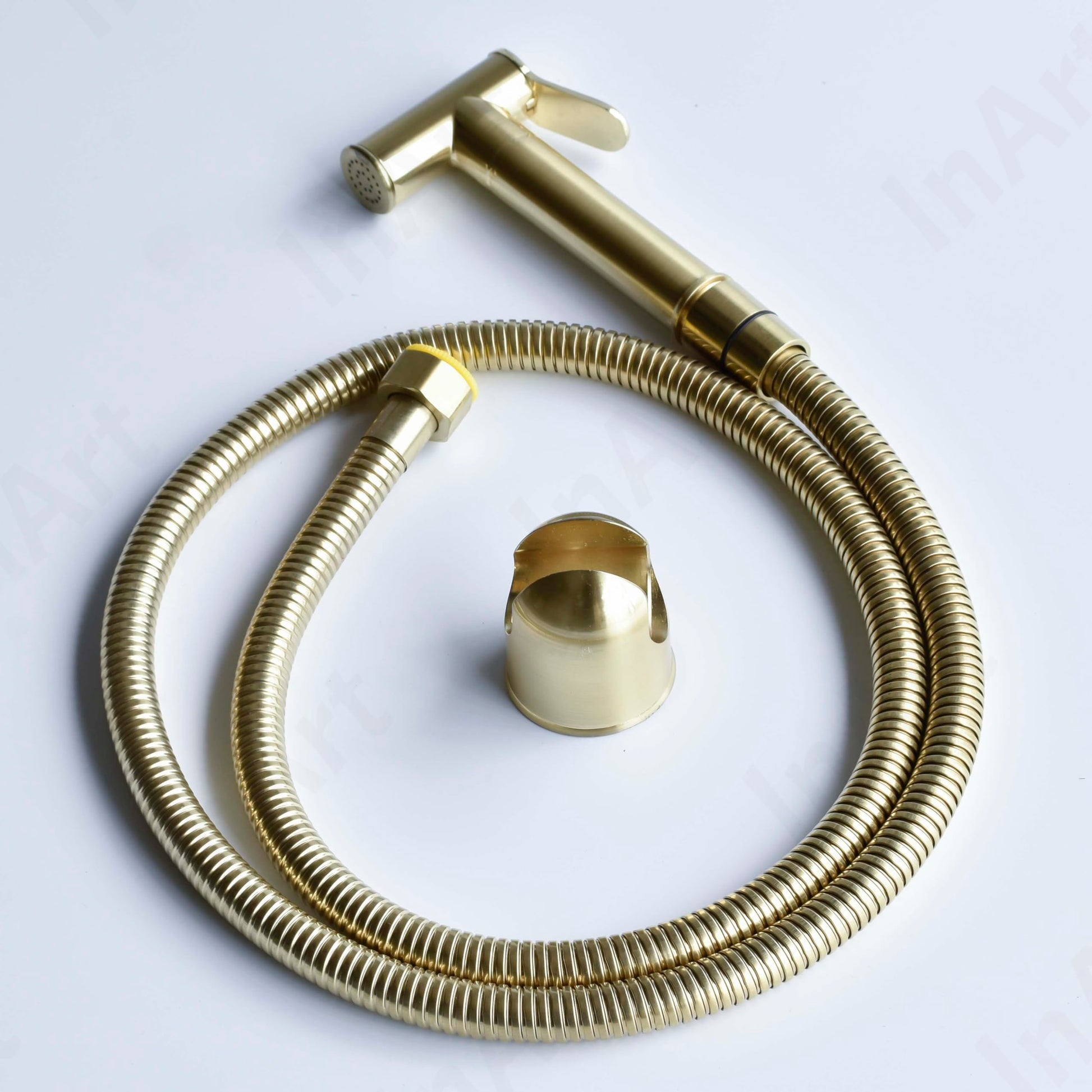 Handheld golden health faucet gun with durable brass body and flexible hose, ideal for Indian washroom