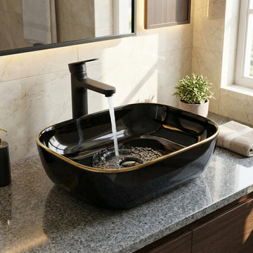 Hindware table top wash basin alternative by InArt, glossy black gold rectangular ceramic basin, front view