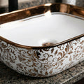 Table top wash basin counter design, rectangular rose gold ceramic basin on vanity top in bathroom