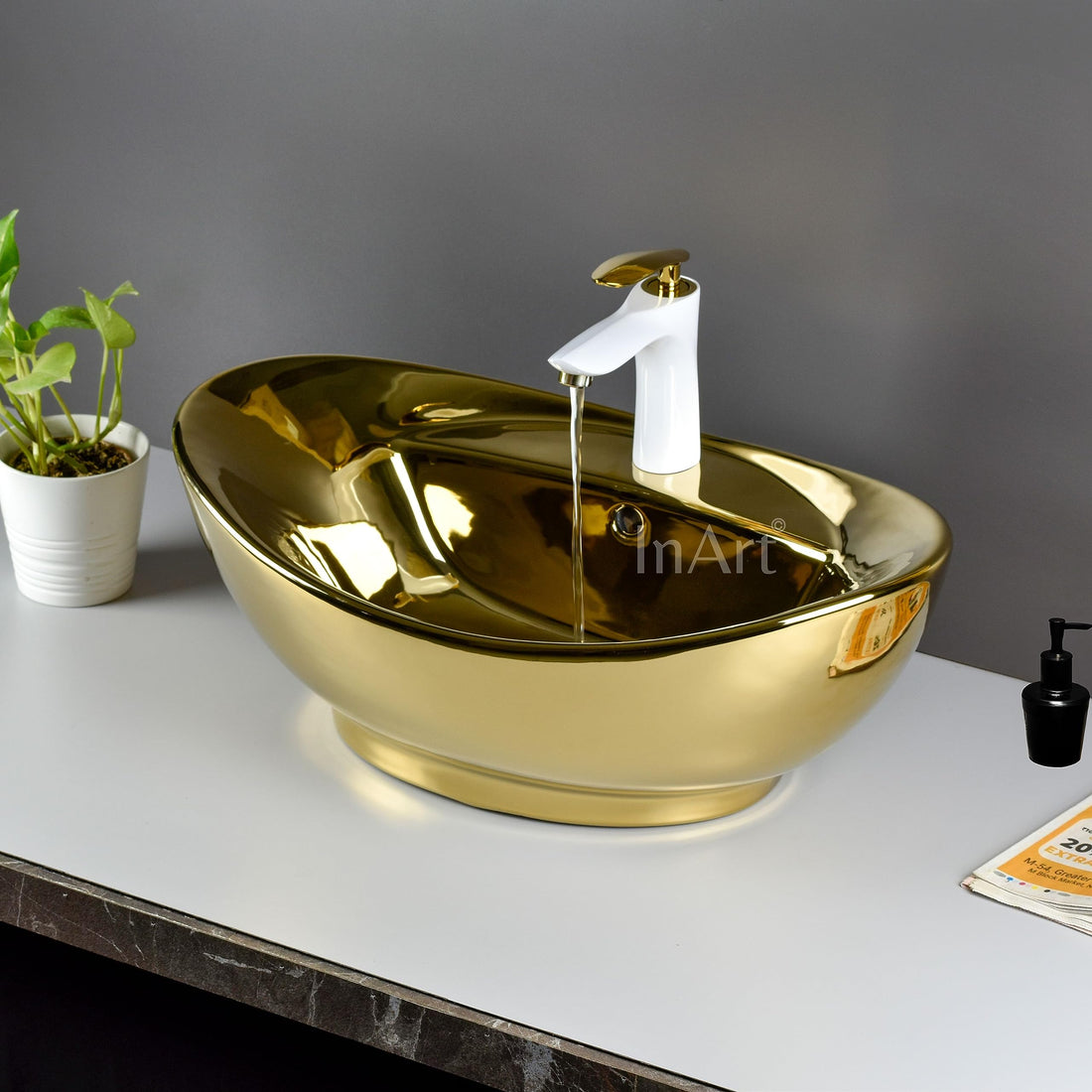 InArt luxury wash basin in gold ceramic oval table top design, main front view