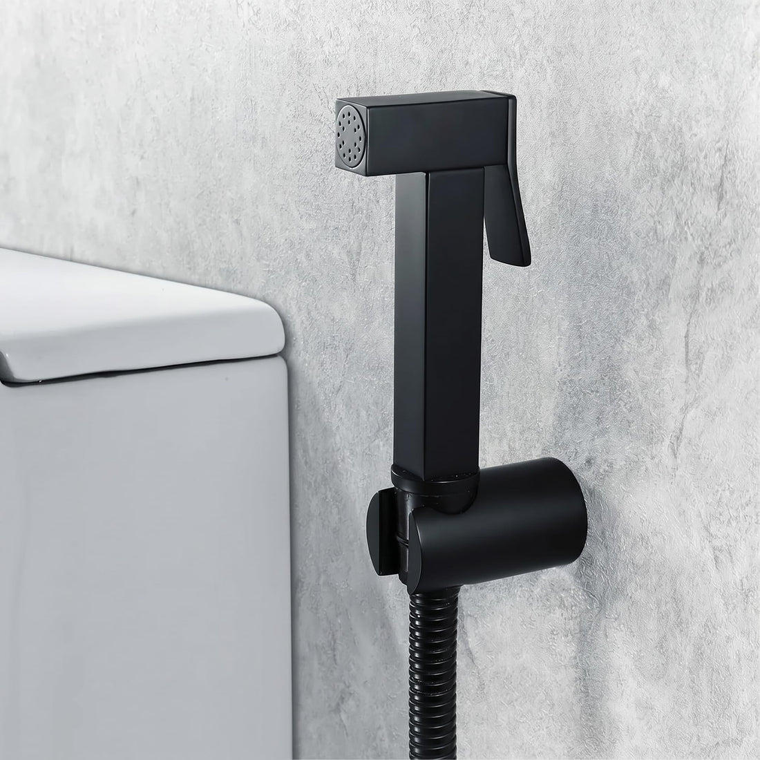 InArt brass health faucet for toilet in matte black finish, jet spray with hose and holder main view