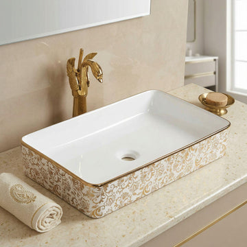 InArt table top wash basin design, ceramic rectangular basin with golden floral finish and glossy white bowl