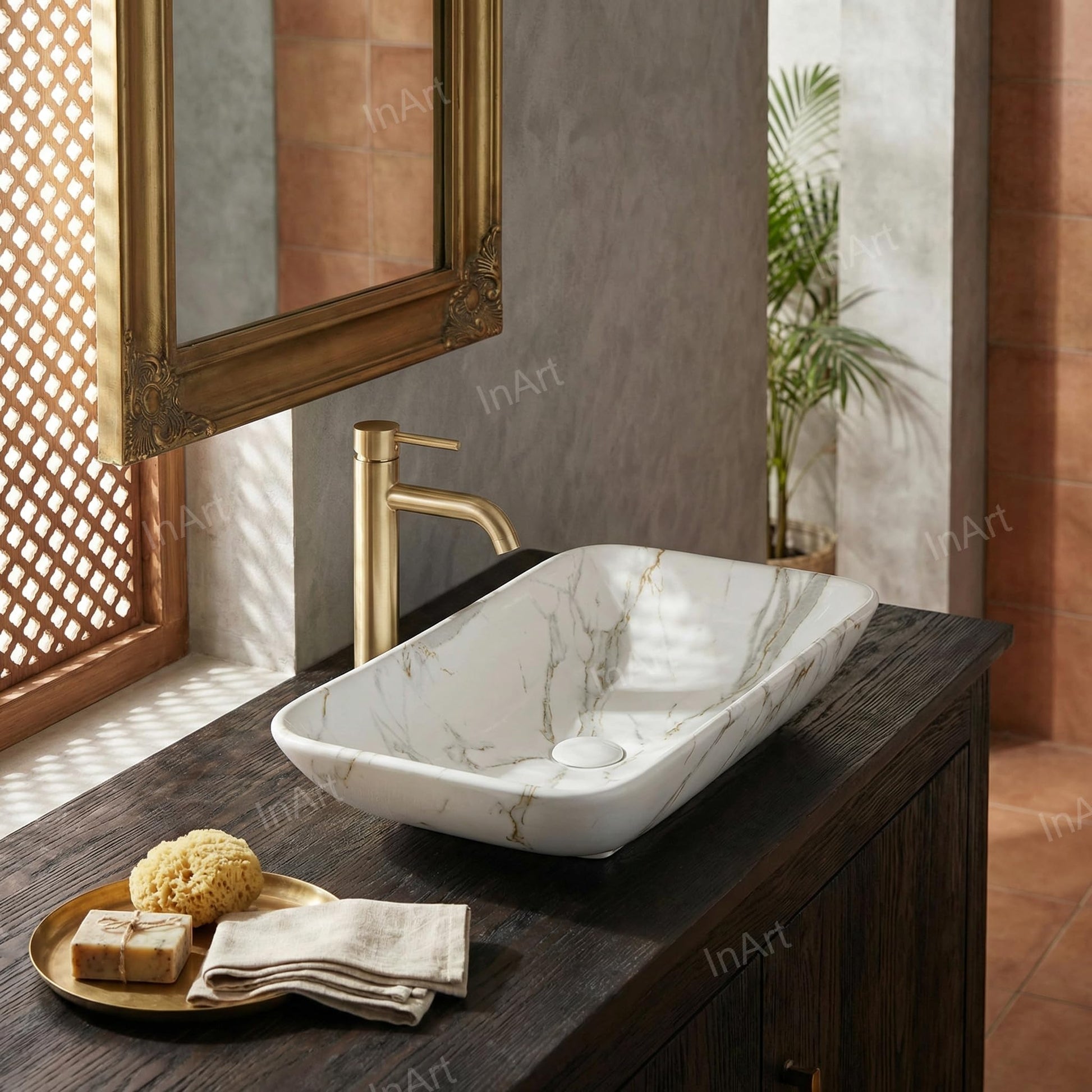 InArt tabletop washbasin with polished marble look glaze, smooth rim and deep bowl detail