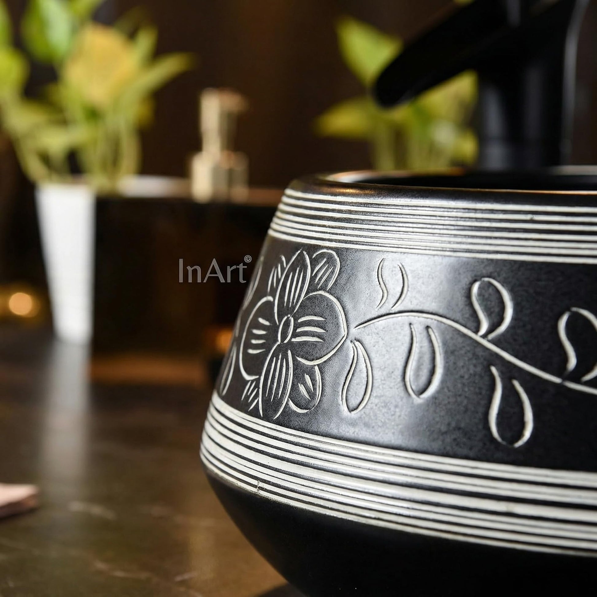 Close-up of InArt black ceramic table top wash basin surface, premium matte finish for washroom counter