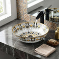 Close-up of glossy ceramic table top wash basin table top, yellow Mexican pattern detailing