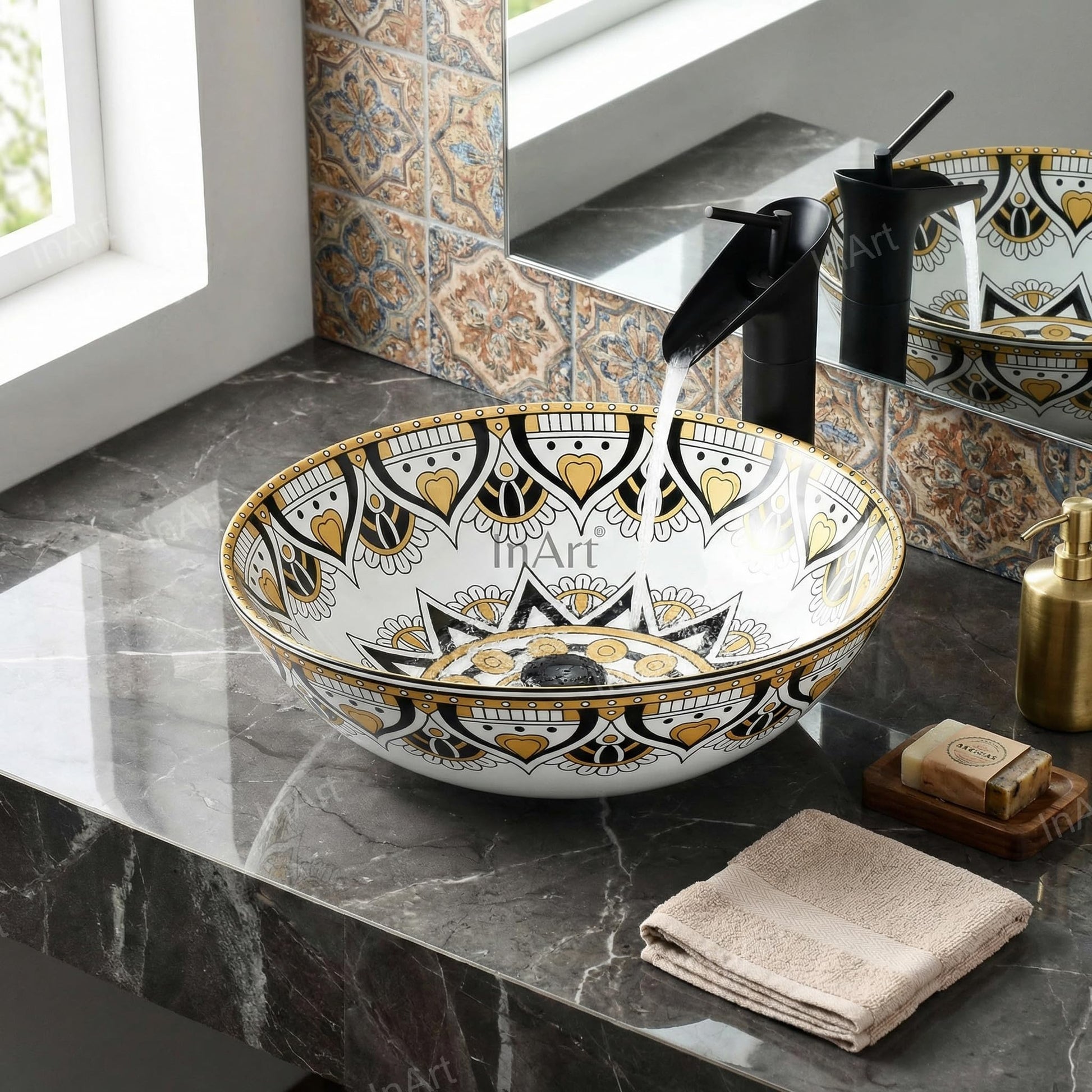 Close-up of glossy ceramic table top wash basin table top, yellow Mexican pattern detailing
