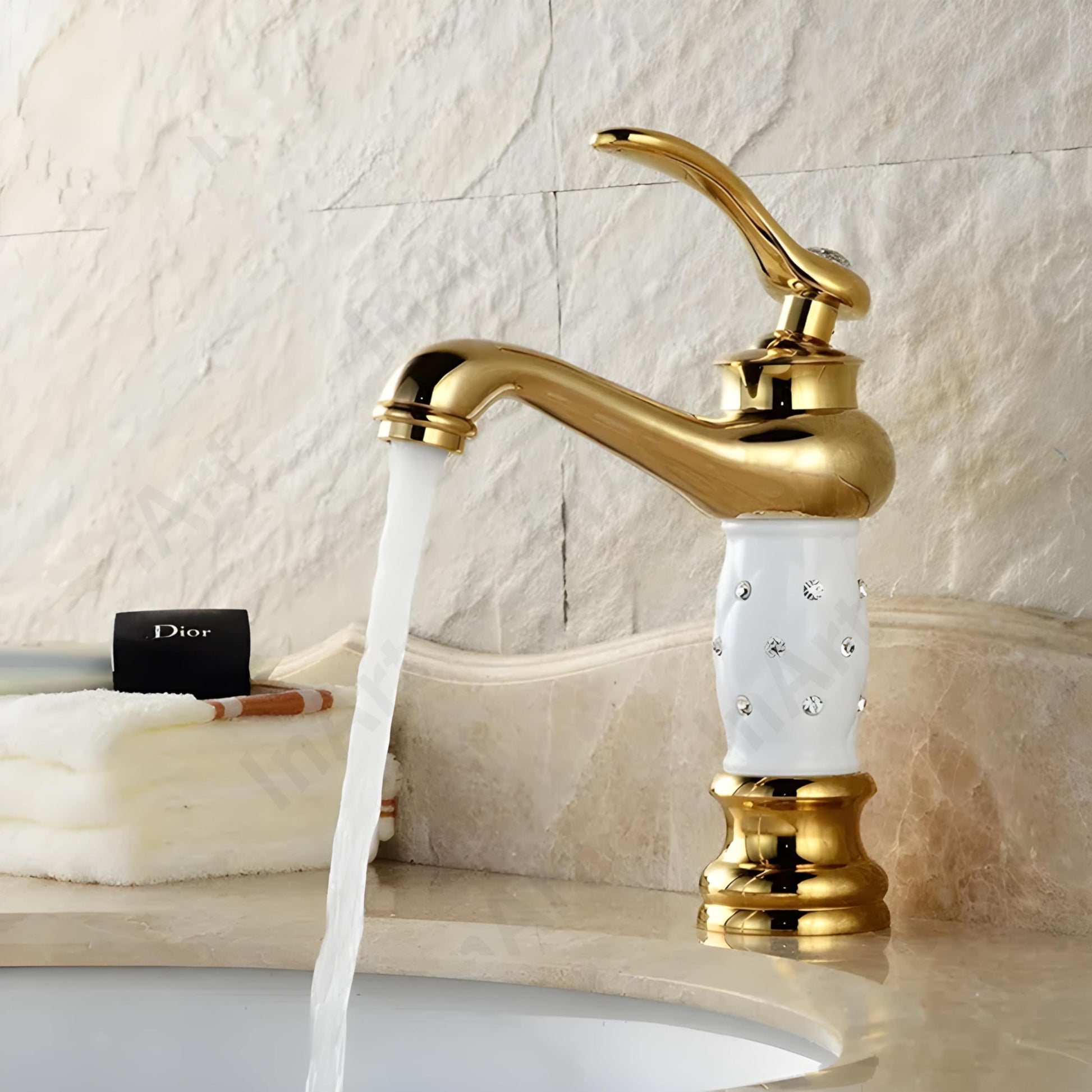 Single lever wash basin mixer single lever in gold finish with white handle, waterfall spout, side angle view