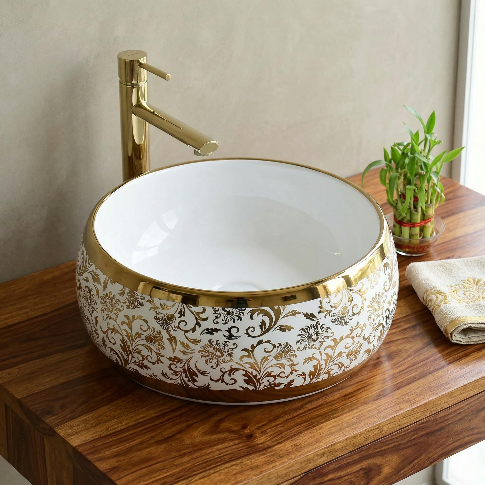 Luxury wash basin by InArt, round ceramic table top design in glossy white with gold rim, front view
