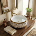 Close-up of golden rim on glossy white ceramic table top wash basin, premium sanitaryware finish detail