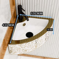 Luxury wash basin with premium gold finish, rectangular ceramic table top basin close-up of smooth edges