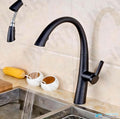 InArt black kitchen tap installed on sink, pull out spray tap for Indian modular kitchen use