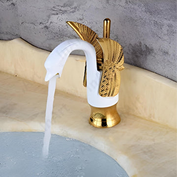 Buy gold wash basin mixer tap online - InArt brass swan shape deck mount single lever tap, waterfall spout