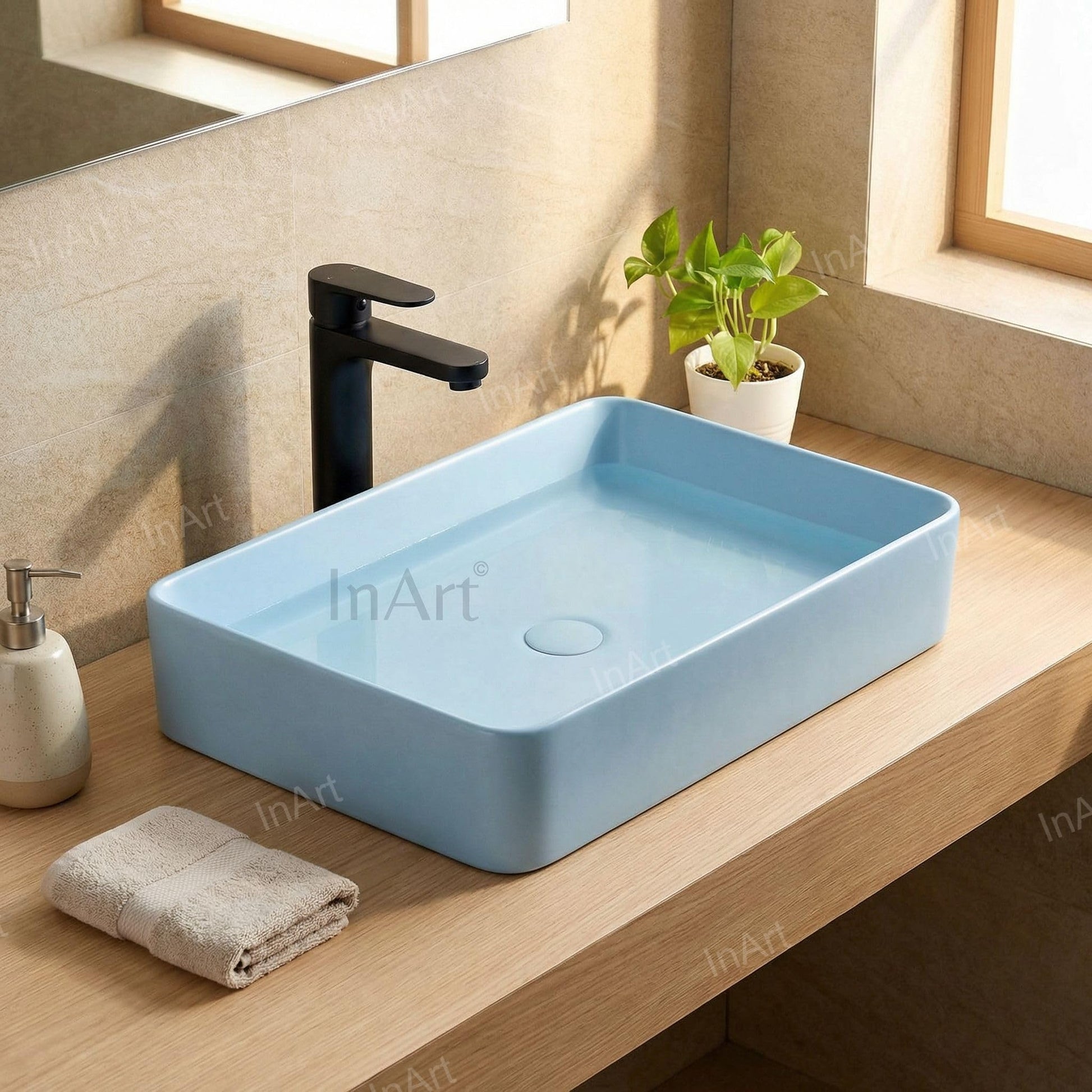 Close-up of glossy blue ceramic finish on InArt table top wash basin, premium sanitaryware detail