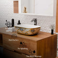 Designer table top basin design in gold ceramic, rectangular wash basin angled view for modern bathroom