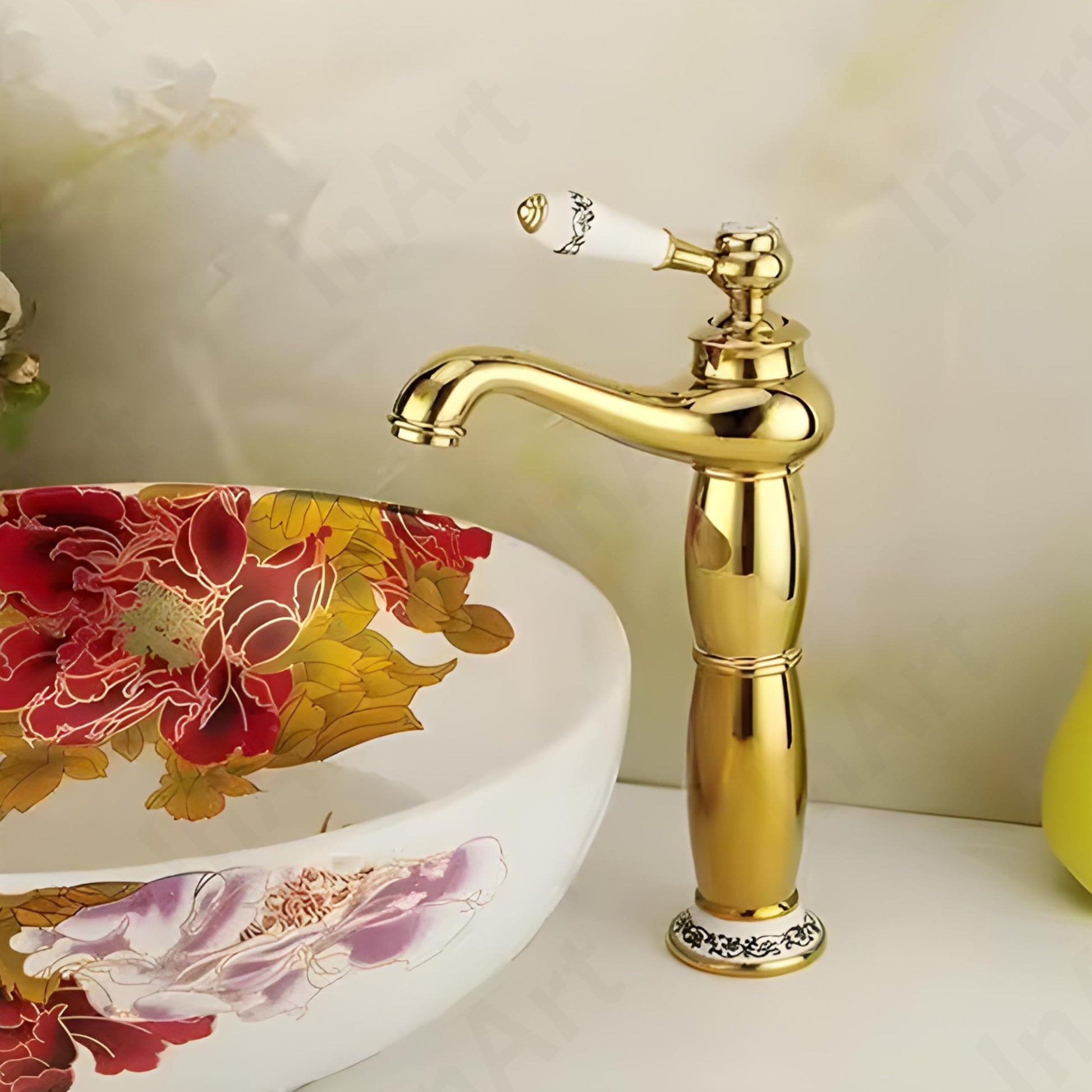 InArt hot and cold water basin mixer tap close-up of ceramic disc cartridge control and antique gold metal body