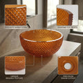 Modern round glass wash basin design in amber tinted glass, tabletop basin side angle