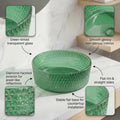 Modern round table top wash basin glass design in glossy green, side angle showing curved rim