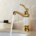 Gold basin tap for wash basin nal design, deck mount single handle mixer with waterfall spout, close-up detail
