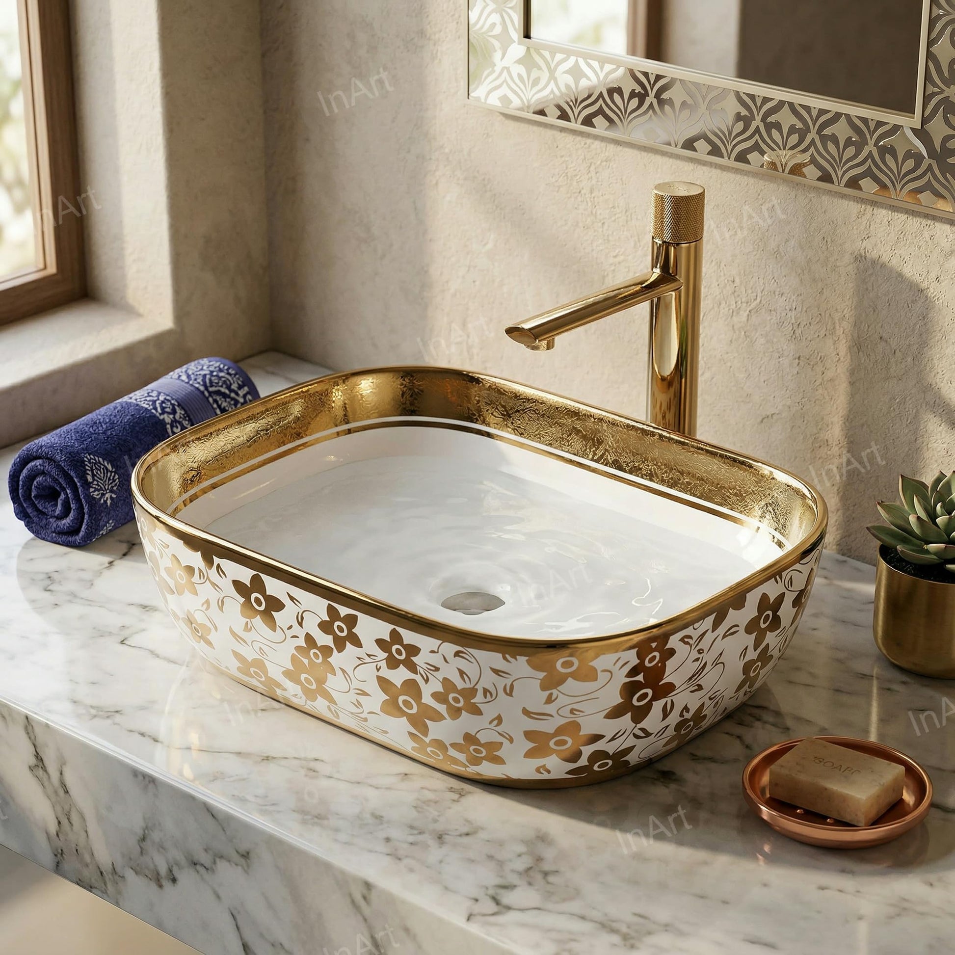 InArt tabletop washbasin close-up of gold rim on glossy white ceramic, premium sanitaryware detail