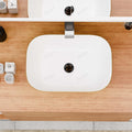 Wash basin table design with above countertop sink look, gold rectangular ceramic table top basin for bathroom