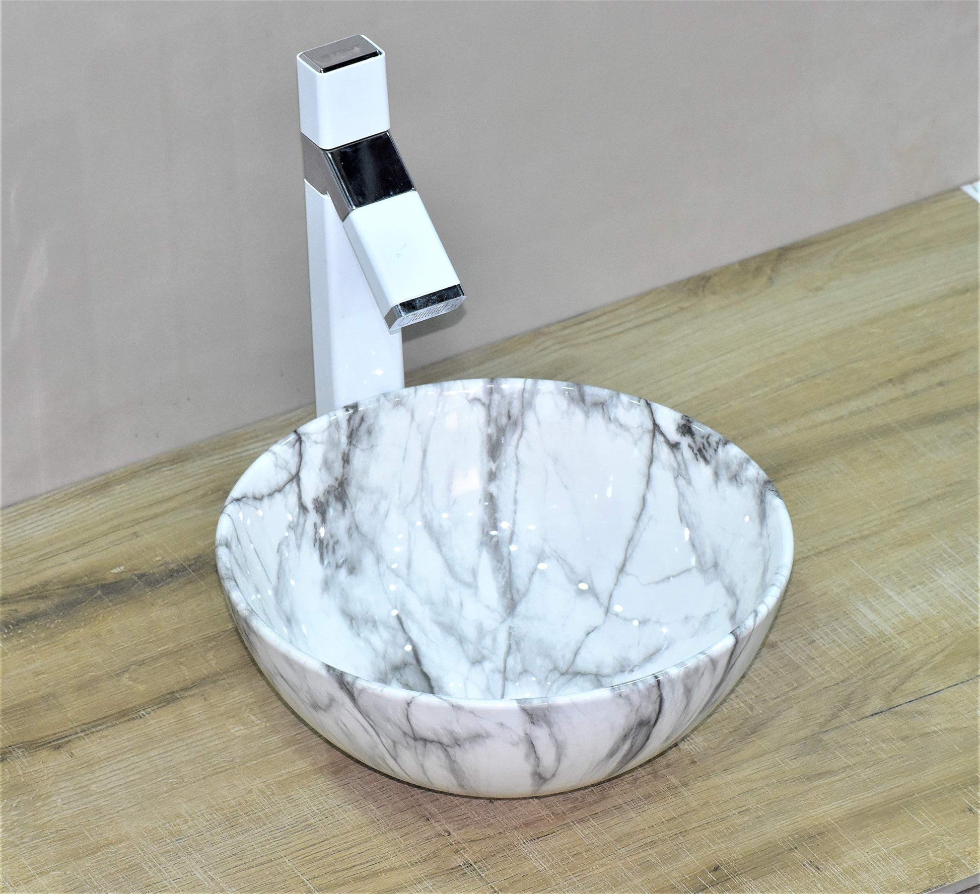 InArt premium sanitaryware tabletop washbasin on vanity counter, white marble finish in bathroom