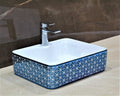 InArt premium ceramic wash basin design for bathroom, glossy blue rectangular table top basin close-up
