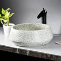 Modern bathroom table wash basin designs, round ceramic table top wash basin in light green, top view