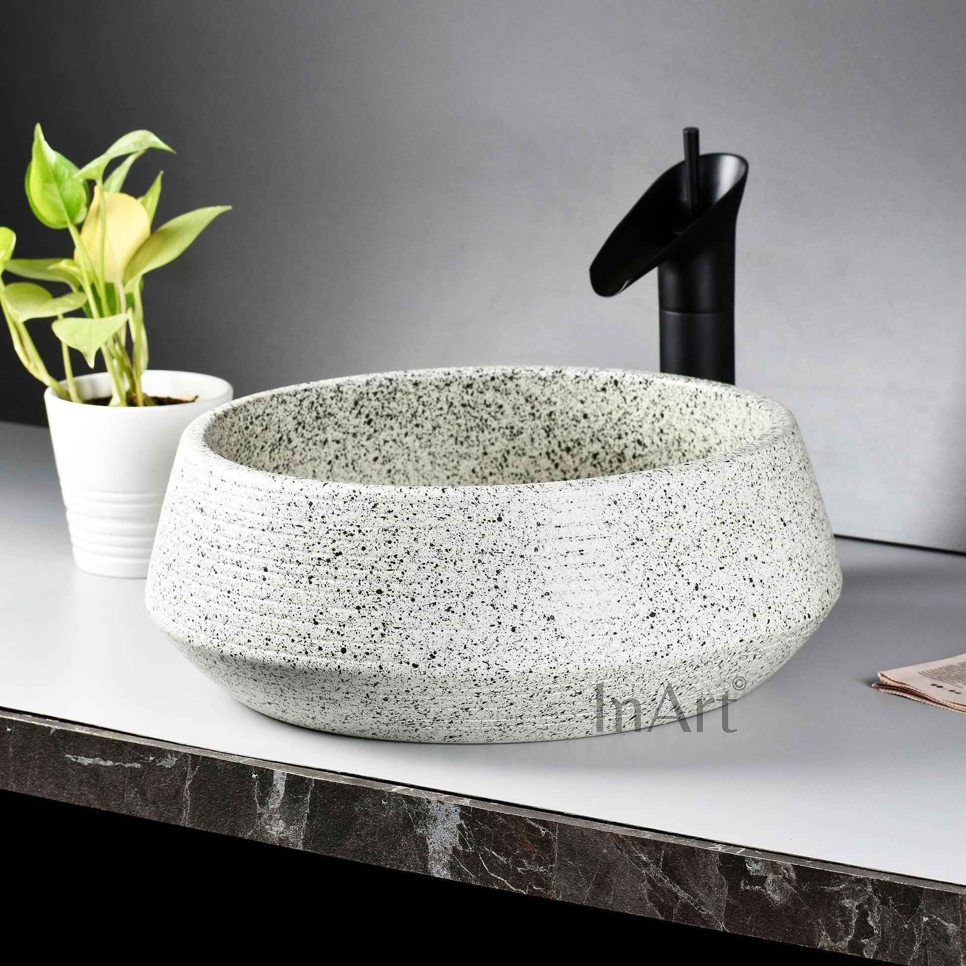 Modern bathroom table wash basin designs, round ceramic table top wash basin in light green, top view