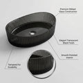Modern bathroom wash basin design featuring oval black glass basin on vanity