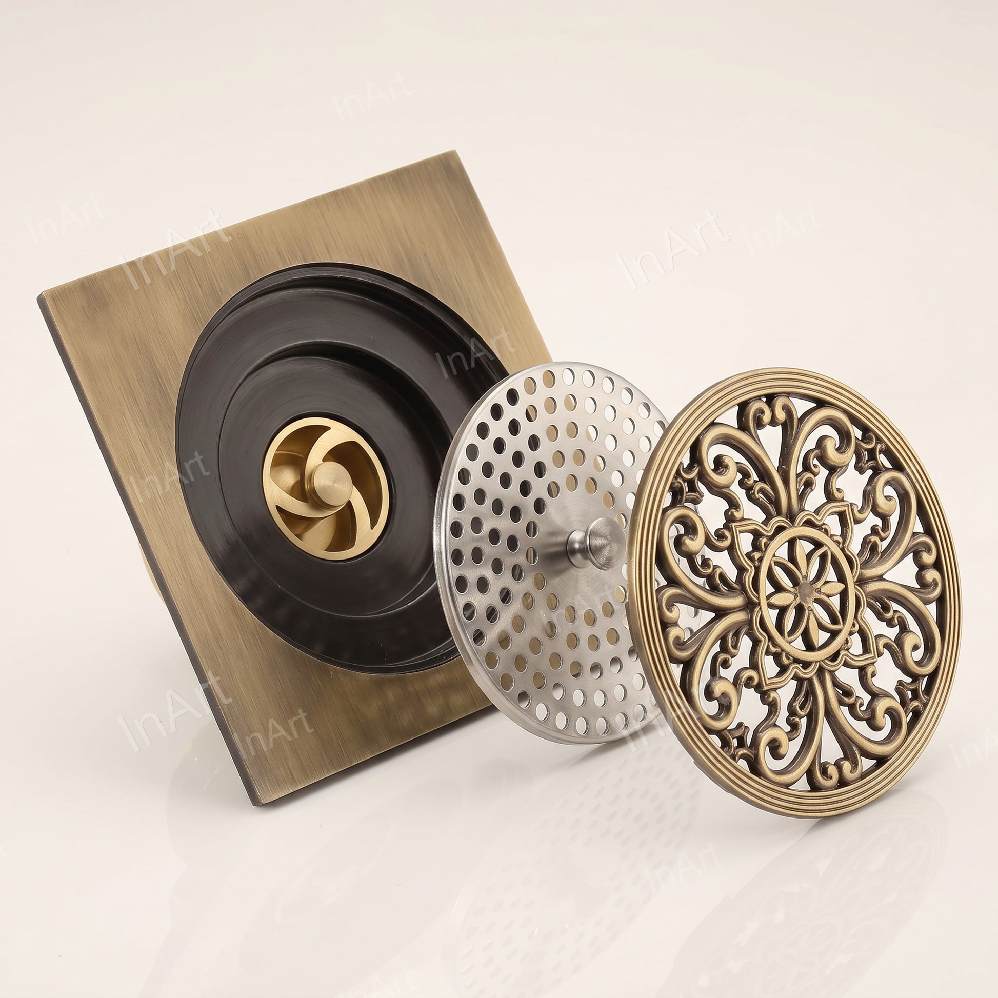 Detail shot of drain opening and grating edges in antique brass finish