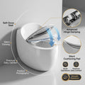 Soft closing toilet seat cover detail on white ceramic commode