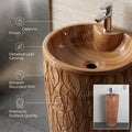 Top view of round bowl area on ceramic pedestal wash basin