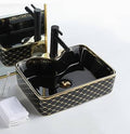 inart  table top wash basin black golden color