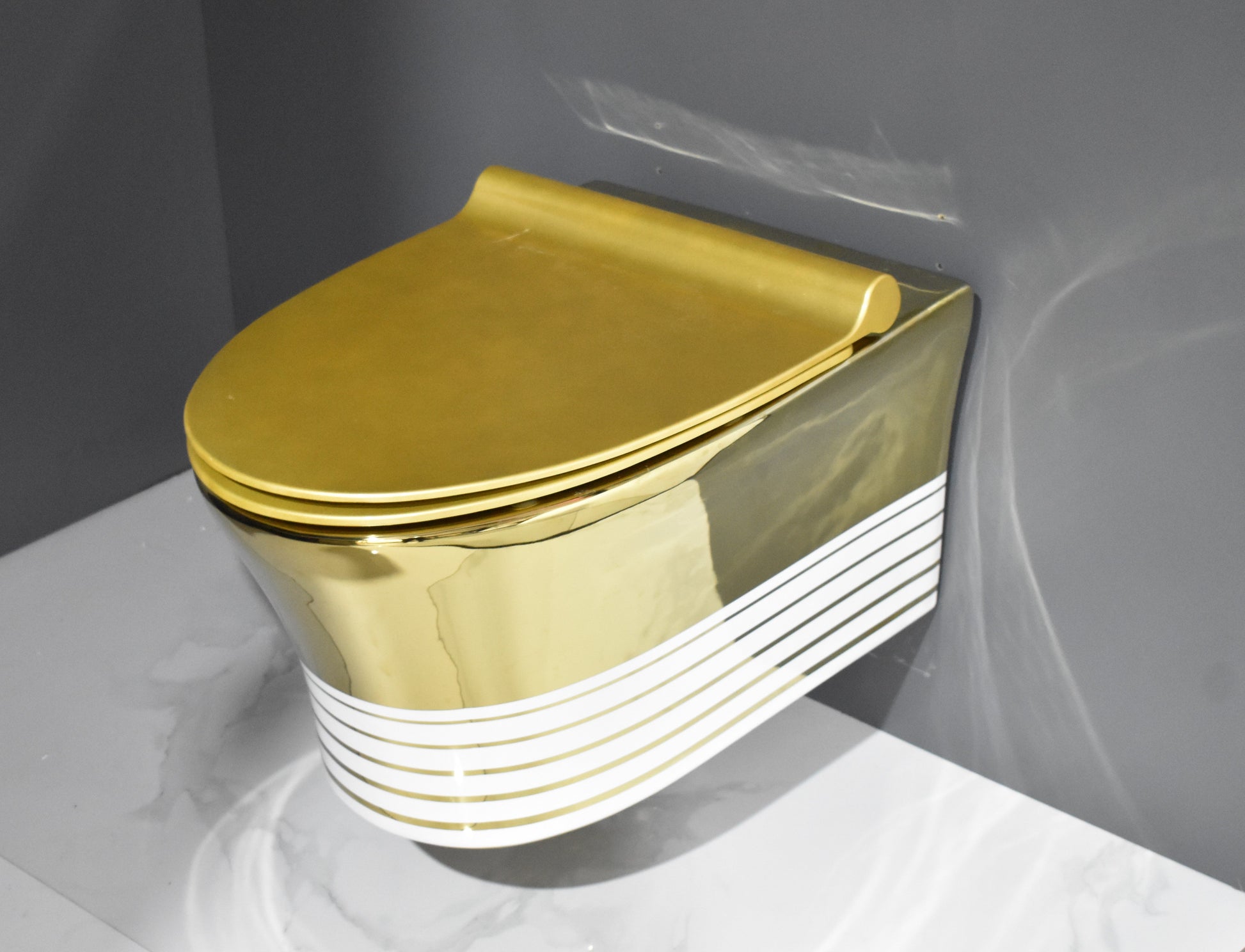 InArt ceramic gold wall hung toilet seat - detailed mounting bracket and installation hardware close-up view